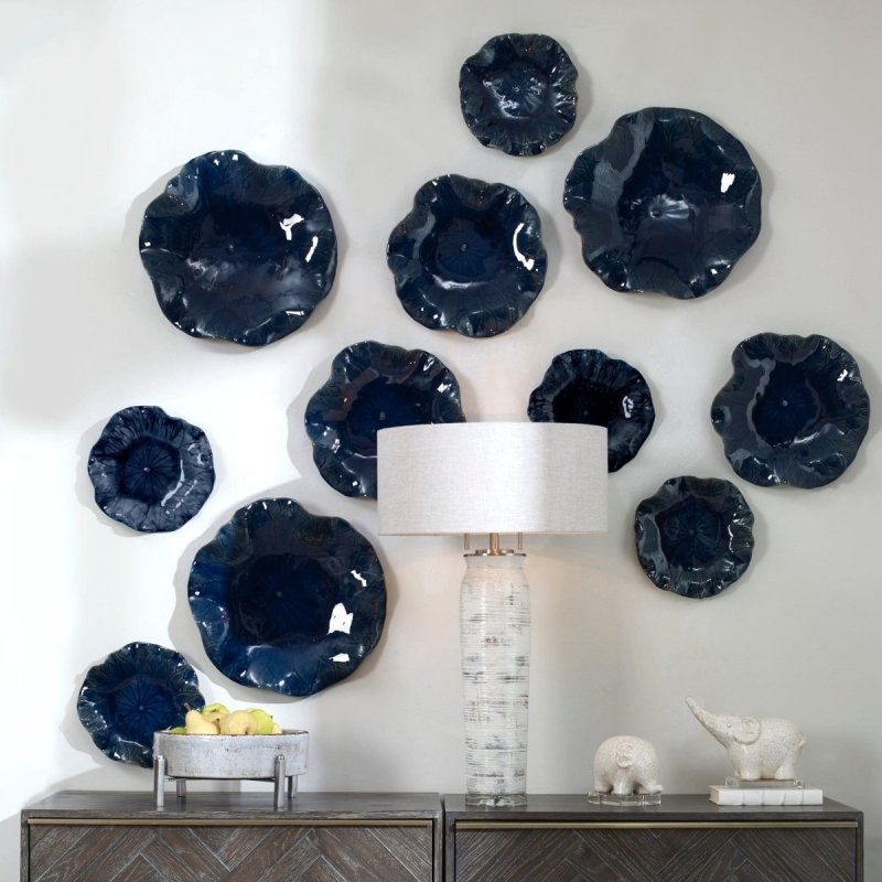 Ceramic Wall Decor styled as sculptural floral wall decor in a bright modern interior