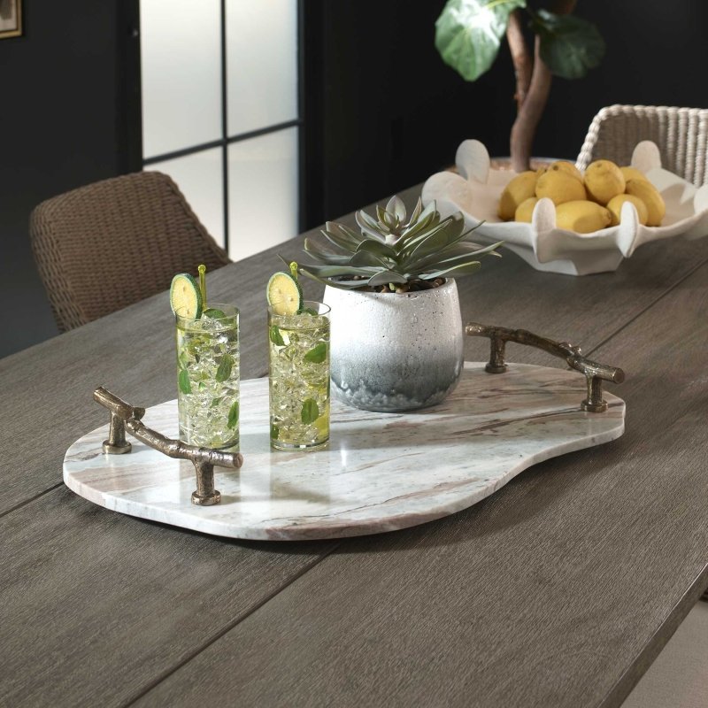 Marble decorative tray with branch-like aluminum handles shown from an angled view