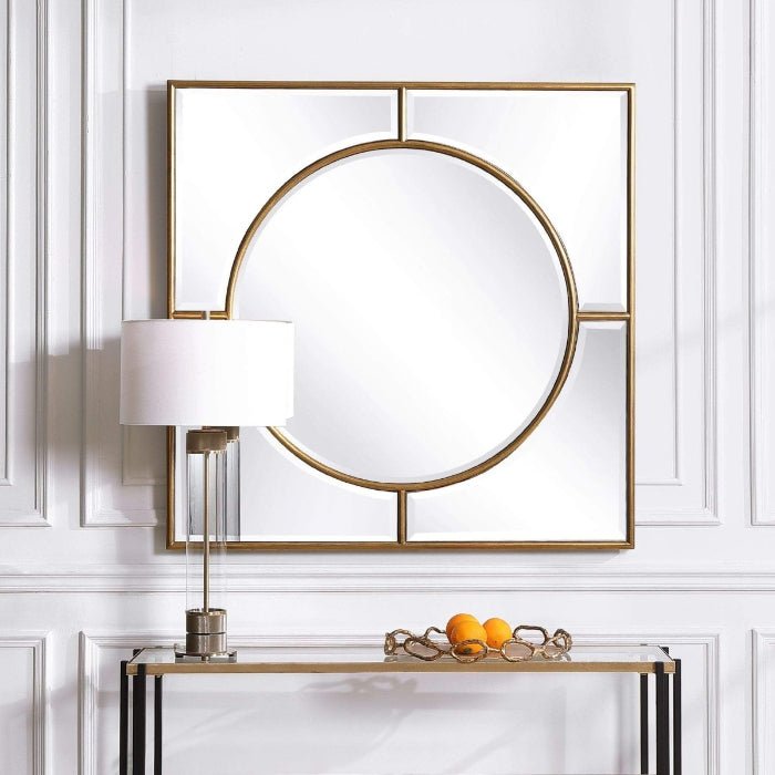 Standford gold square wall mirror with a slim metallic frame styled above a light-toned console table