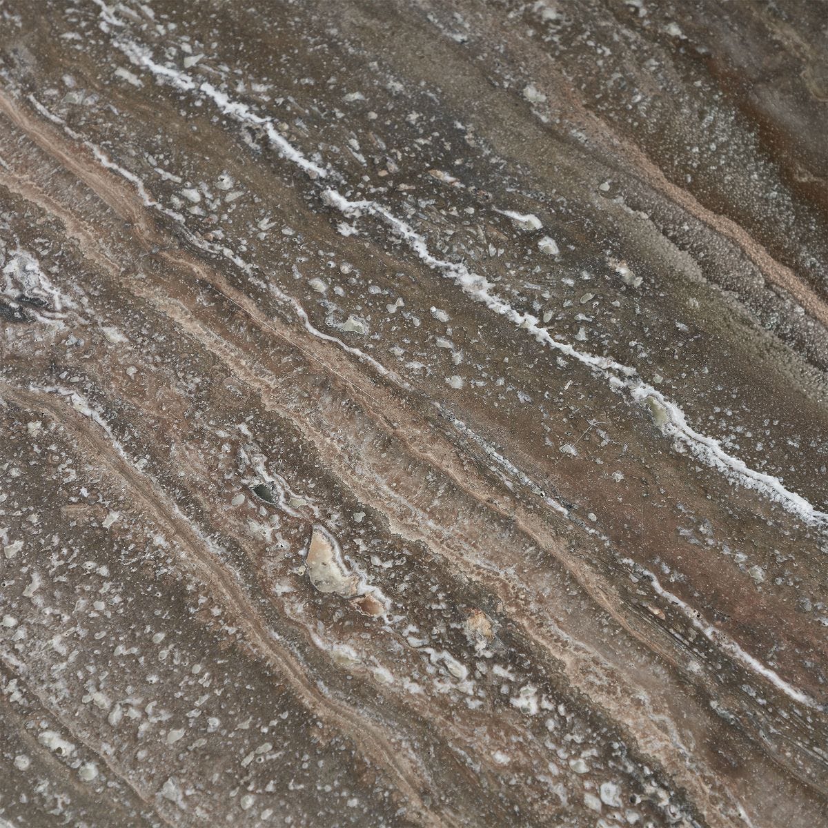 Close-up of the textured travertine top on the Midsummer accent table