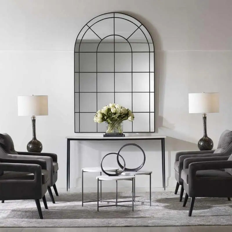 Grand Black Iron Arched Mirror in living room