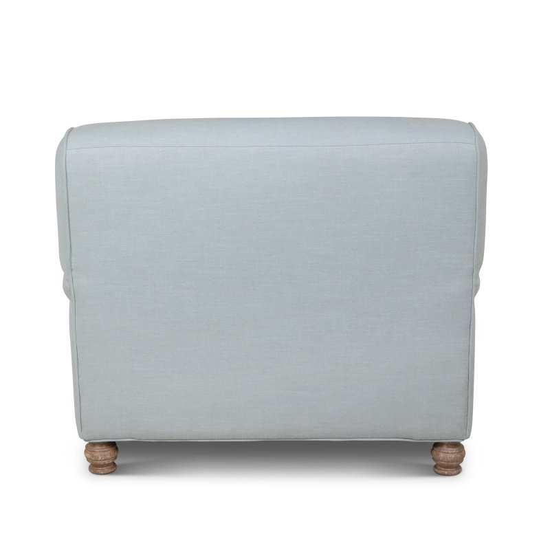 Rear view of the Kenwood Serene Sky blue upholstered chair showing its tailored back and turned wood feet
