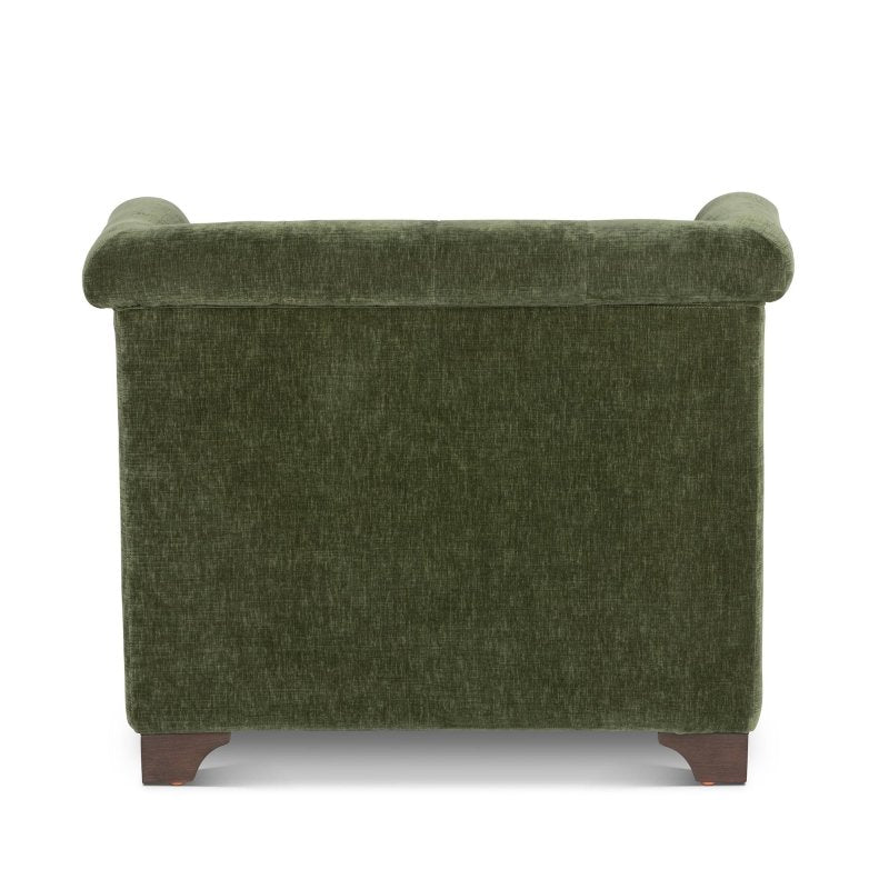 Rear view of the Scroll Arm moss green upholstered chair showing its tailored back and rolled crest