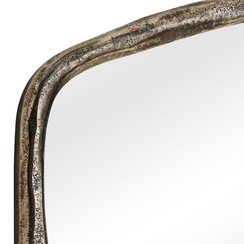Side view of the Hammered Antique Nickel Arched Mirror by Uttermost