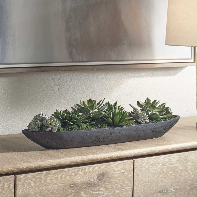 Uttermost Verde succulent centerpiece styled on a console