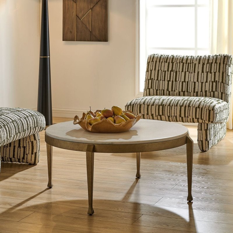 Close-up of white marble top on the Tylan White Marble Round Coffee Table