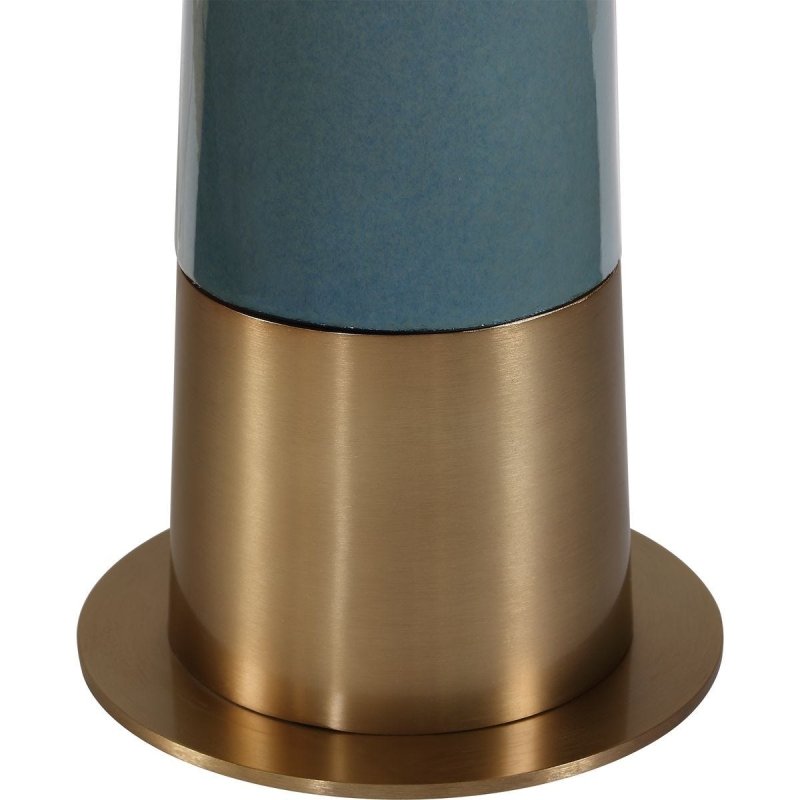 Close-up of the Riccardi floor lamp blue ceramic body and brass foot