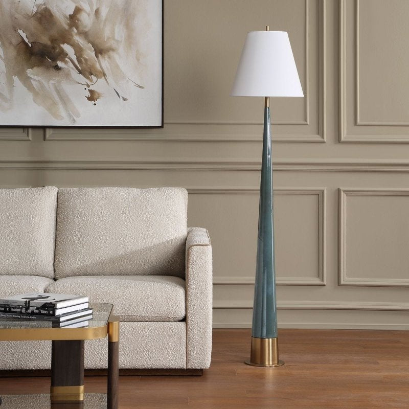 Riccardi blue floor lamp styled in a paneled living room