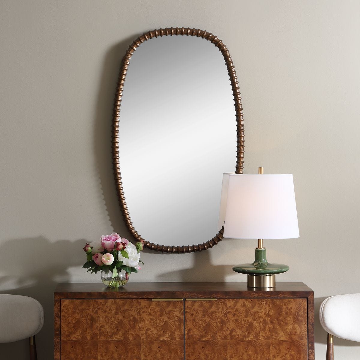 Apphia Bronze Ribbed Wall Mirror styled in a wall setting
