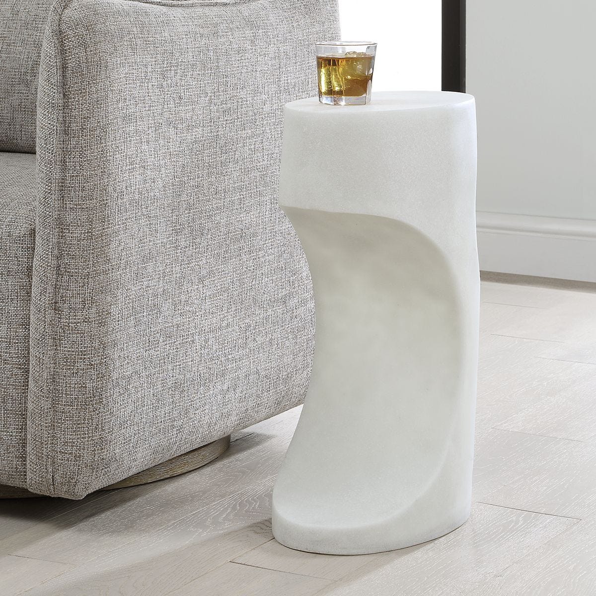 Detail view of the Stevie White Stone Indoor-Outdoor Accent Table finish and construction