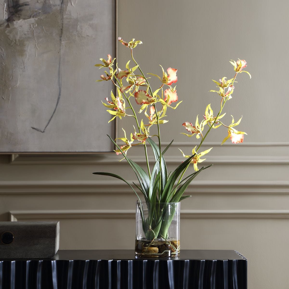 Spider Orchid Coral Yellow Arrangement styled in an interior setting