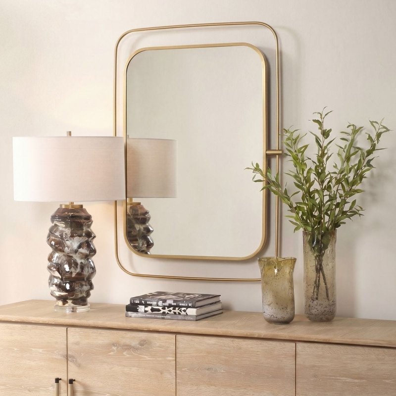 Side profile of the Moreni Antique Brass Rounded Wall Mirror by Uttermost