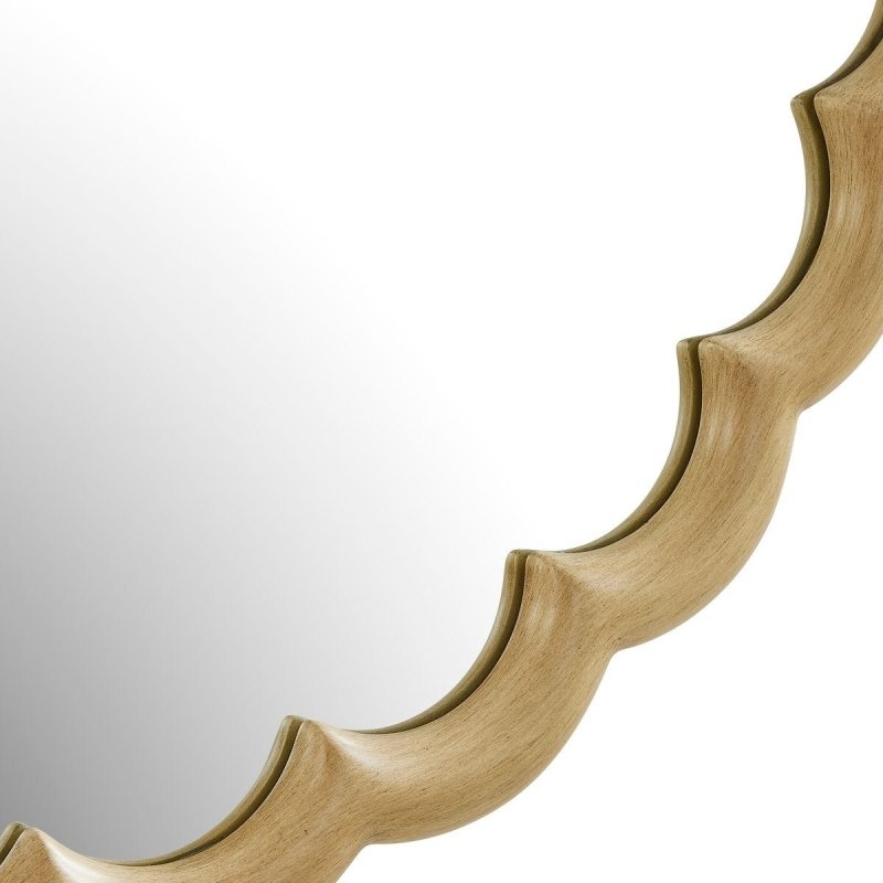 Detail view of the additional burnished ivory finish on the Cerrito Burnished Ivory Round Wall Mirror
