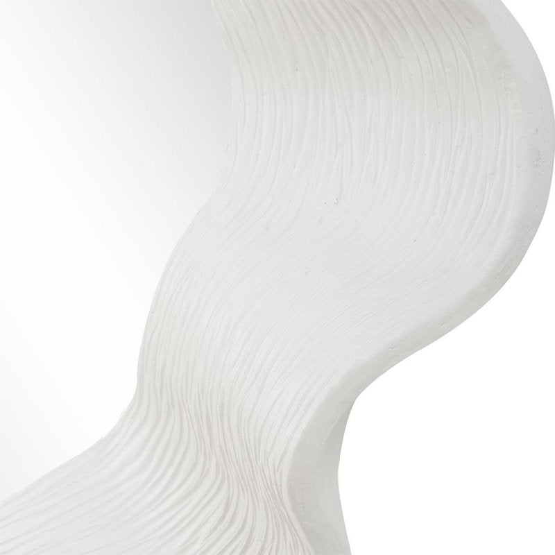 Close-up of the Wave Length Round Mirror textured white frame