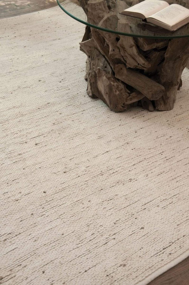 Uttermost Barhara reversible rug styled with a decorative accent