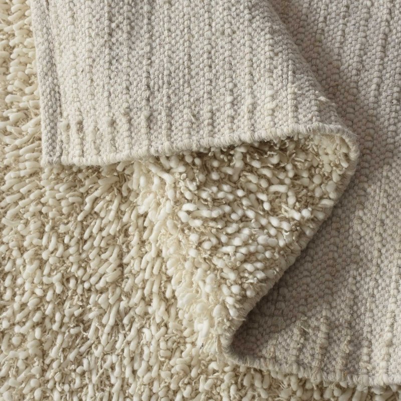 Caramont Ivory 6 X 9 Rug - Rugs