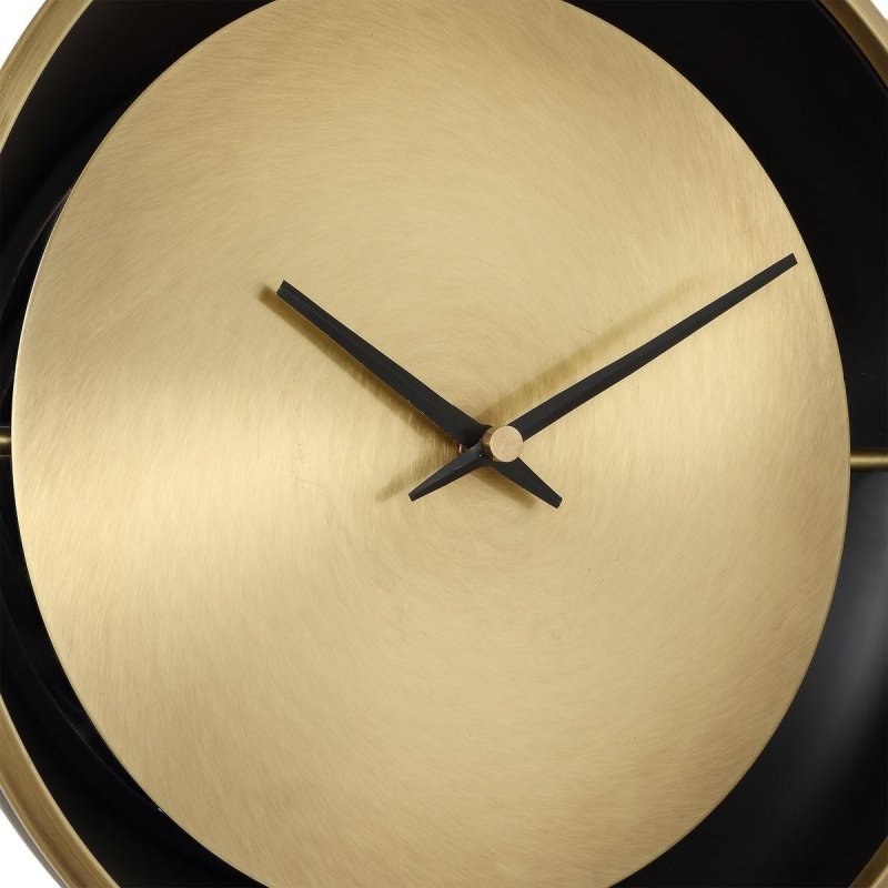 Close-up of slim black clock body on the Velar Brass and Black Marble Table Clock