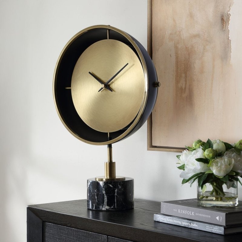 Side profile view 2 of the Velar Brass and Black Marble Table Clock by Uttermost