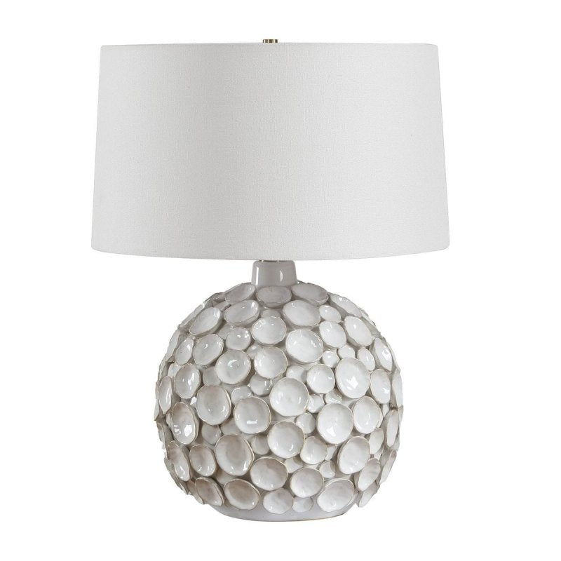 Hartley White Petal Ceramic Table Lamp by Uttermost on a white background