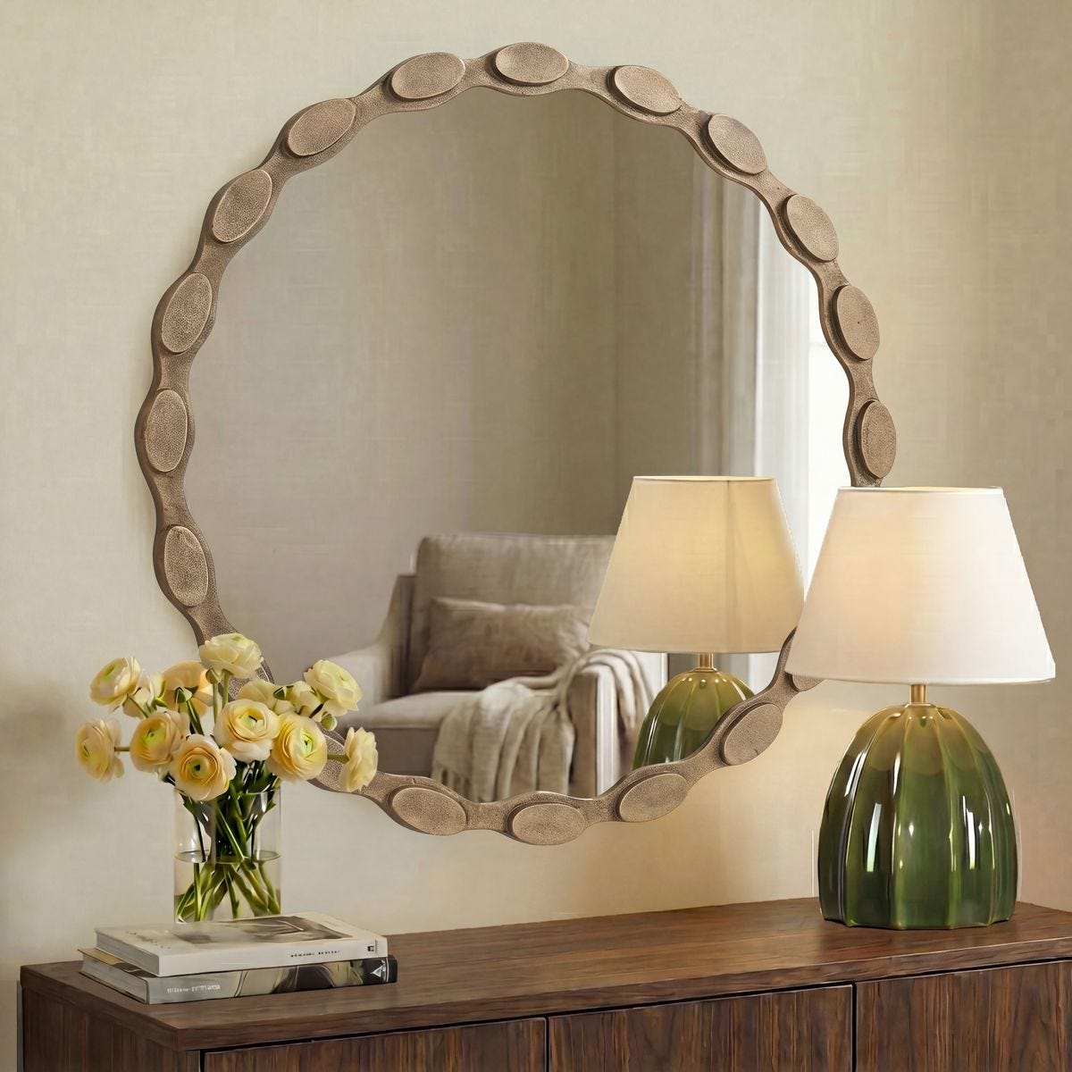 Marietta Aged Brass Round Wall Mirror styled in a room setting