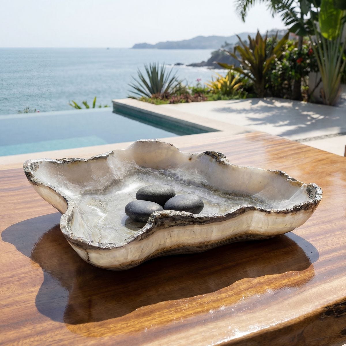 Lunara Gray Onyx Indoor-Outdoor Bowl styled in an outdoor setting