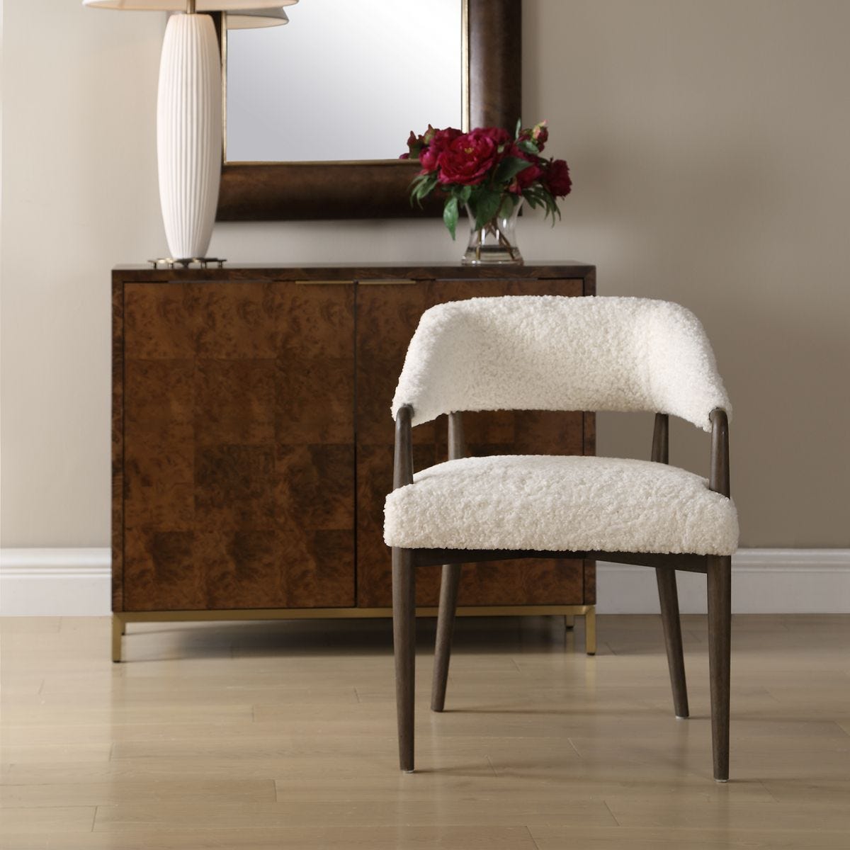 Austell Dark Walnut Faux Shearling Dining Chair styled in a room setting