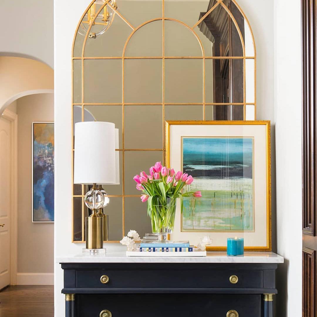 How do I choose between art and a mirror for my foyer? - Modest Hut
