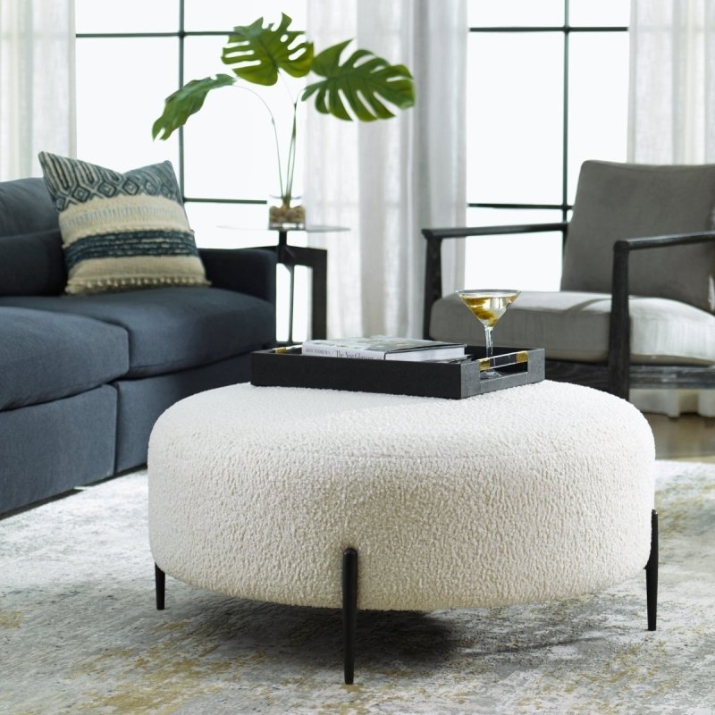 Arles plush white ottoman in faux-shearling upholstery with black metal legs
