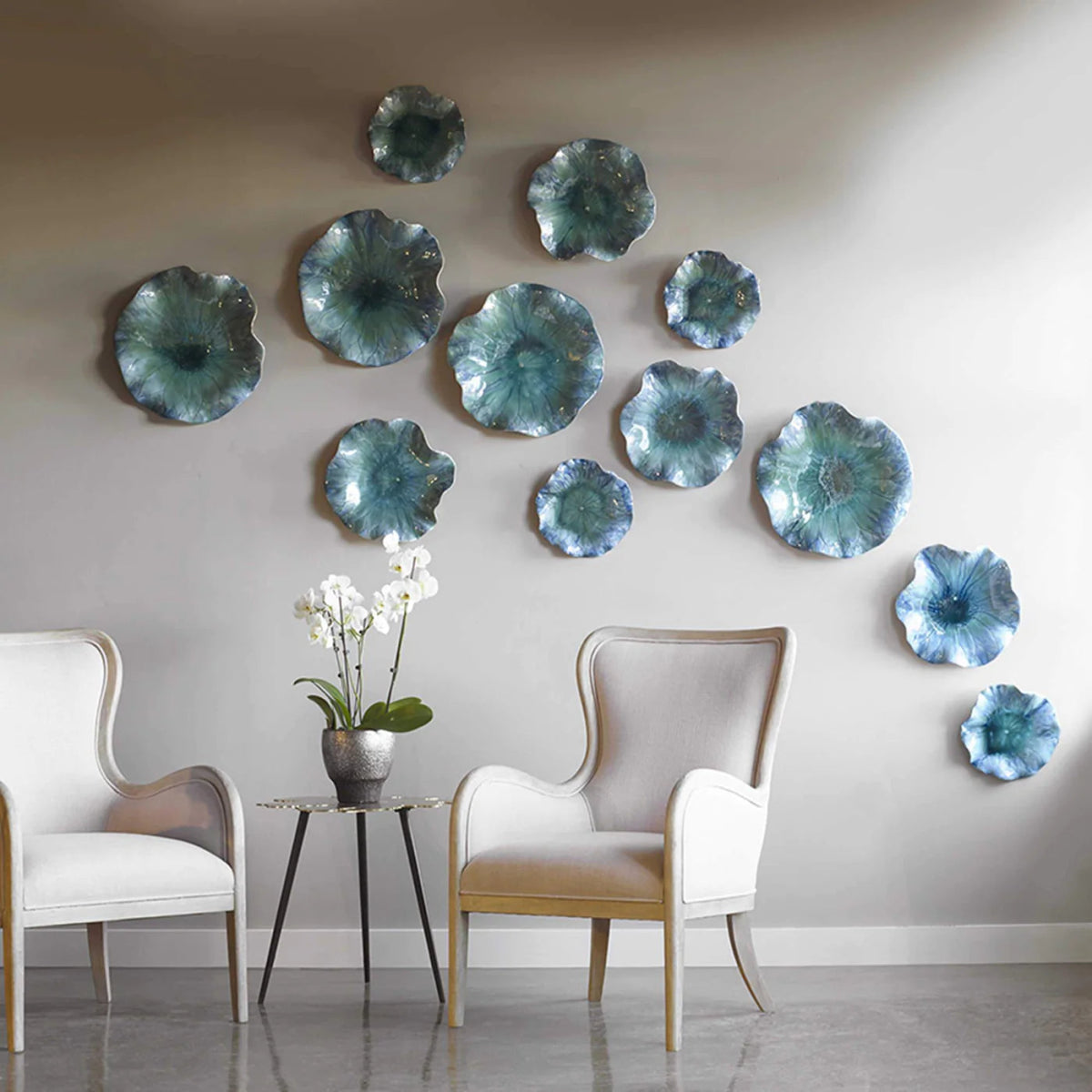 Collection of ceramic wall decor including handcrafted wall art, sculptural ceramic pieces, and textured wall hangings for modern interiors