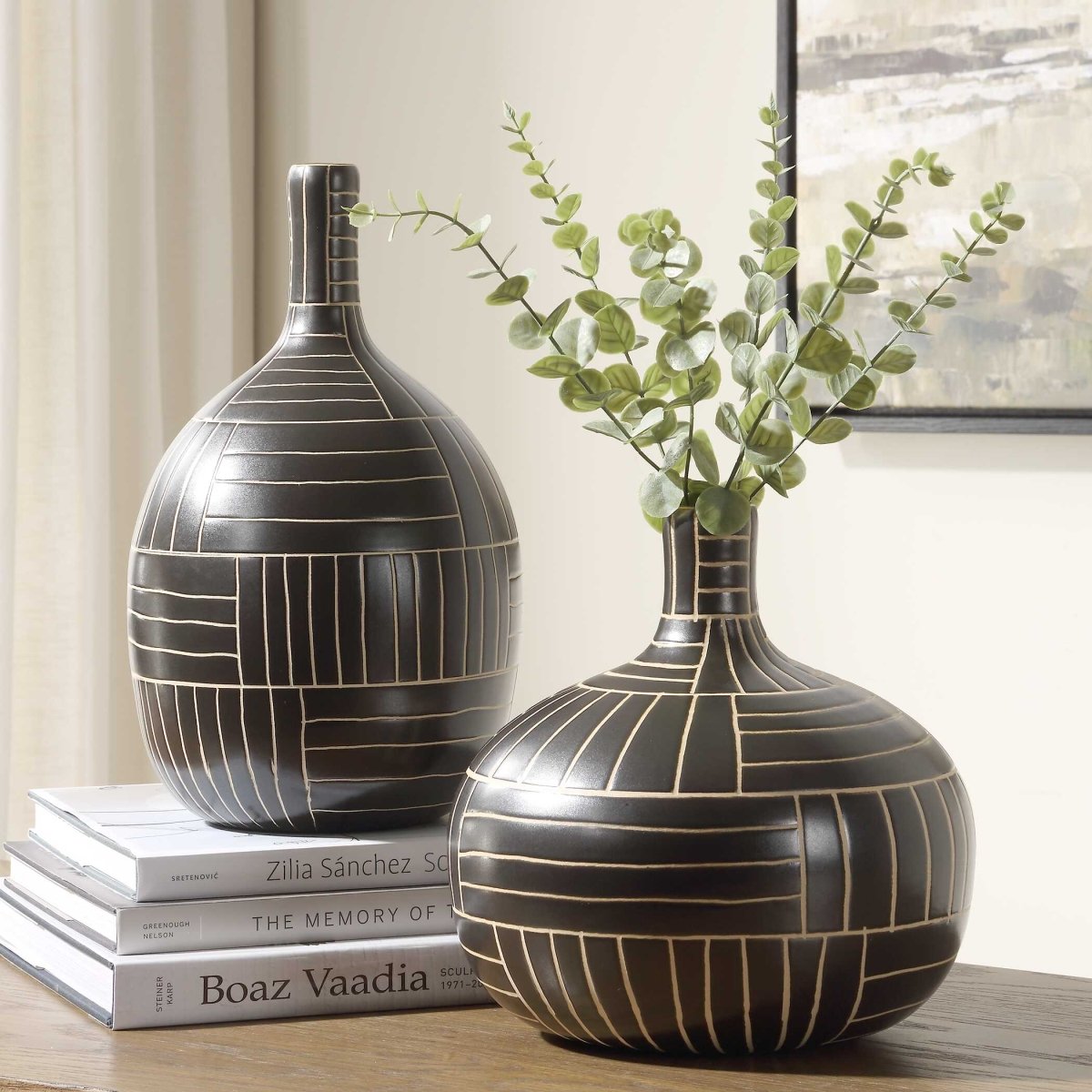 Collection of decorative vases including modern ceramic vases, glass vessels, sculptural vases, and floor vases in various styles