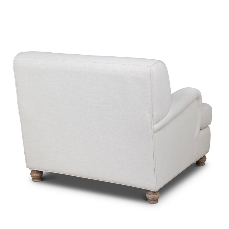 Rear three-quarter view of the Kenwood ivory upholstered accent chair and curved back silhouette