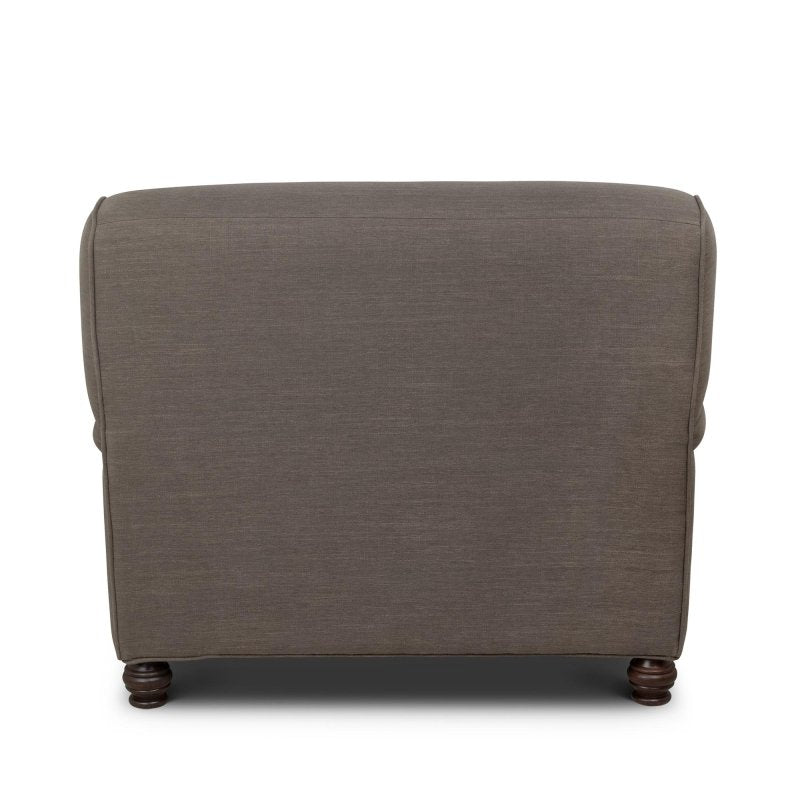 Rear view of the Kenwood mocha brown upholstered chair showing its tailored back and turned wood feet