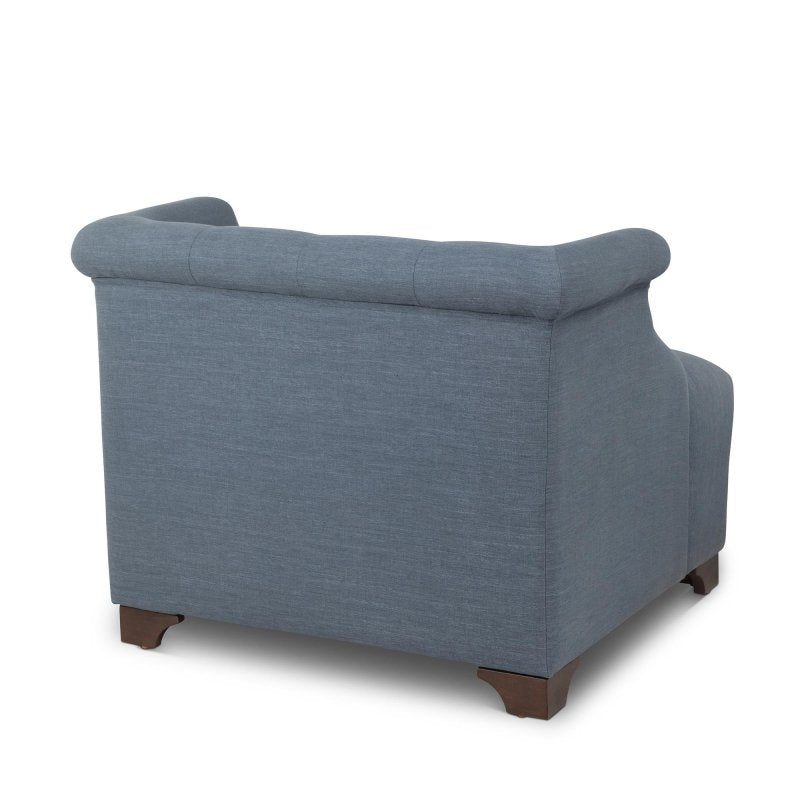 Rear three-quarter view of the Scroll Arm heathered navy blue accent chair with an upholstered back and wood block feet