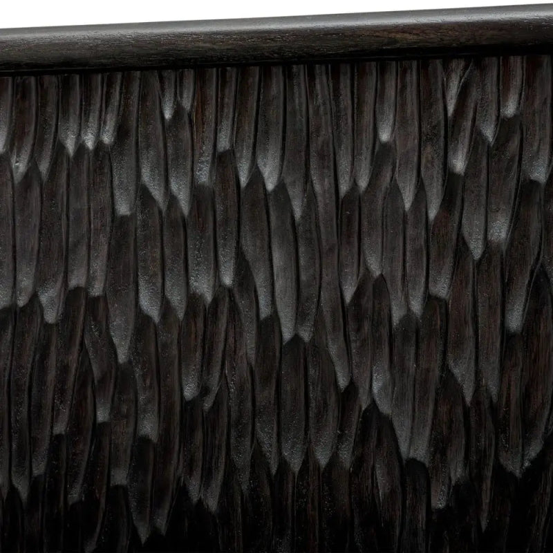Close-up of a textured dark brown surface with a wicker pattern