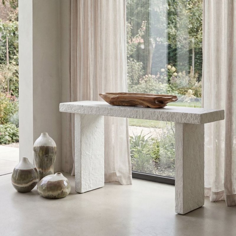 Hagan Indoor-Outdoor Limestone Console Table styled in an outdoor setting