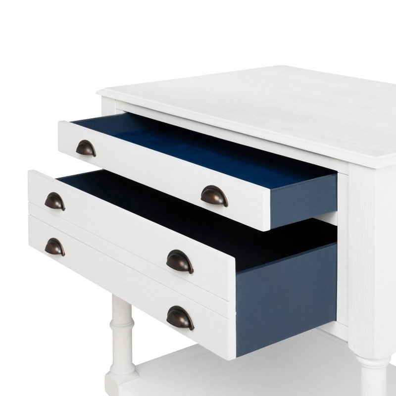Close-up of the Bimini kitchen island's three open drawers with dark blue interiors and black cup pulls