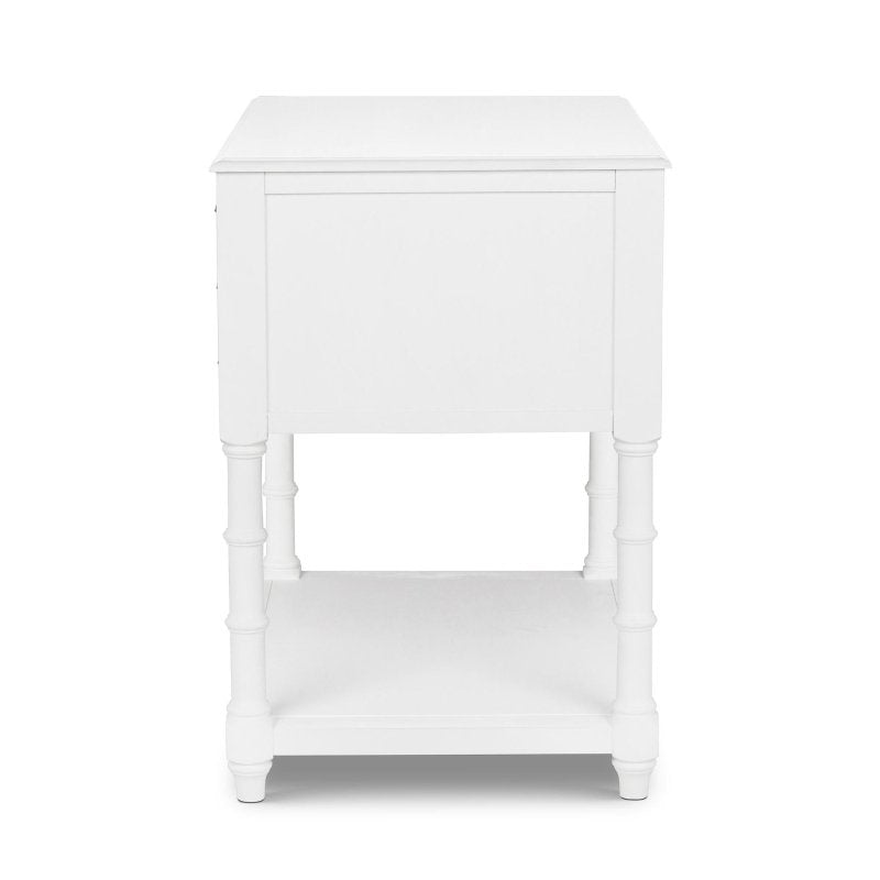 Right-side view of the Bimini whitewash kitchen island with a paneled cabinet body and faux bamboo legs