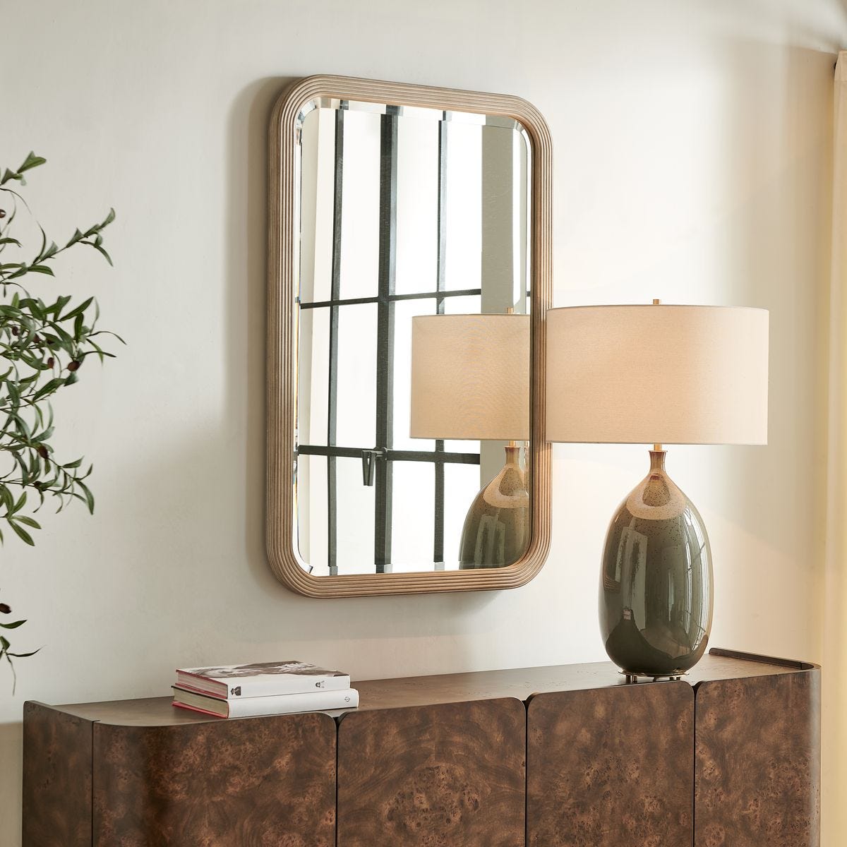 Side view of the Emari Warm Gray Reeded Wood Wall Mirror by Uttermost