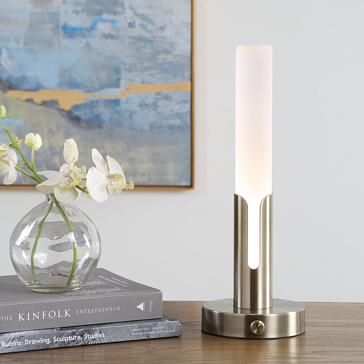 Tron Brass Frosted Acrylic Rechargeable Lamp styled in a styled room setting