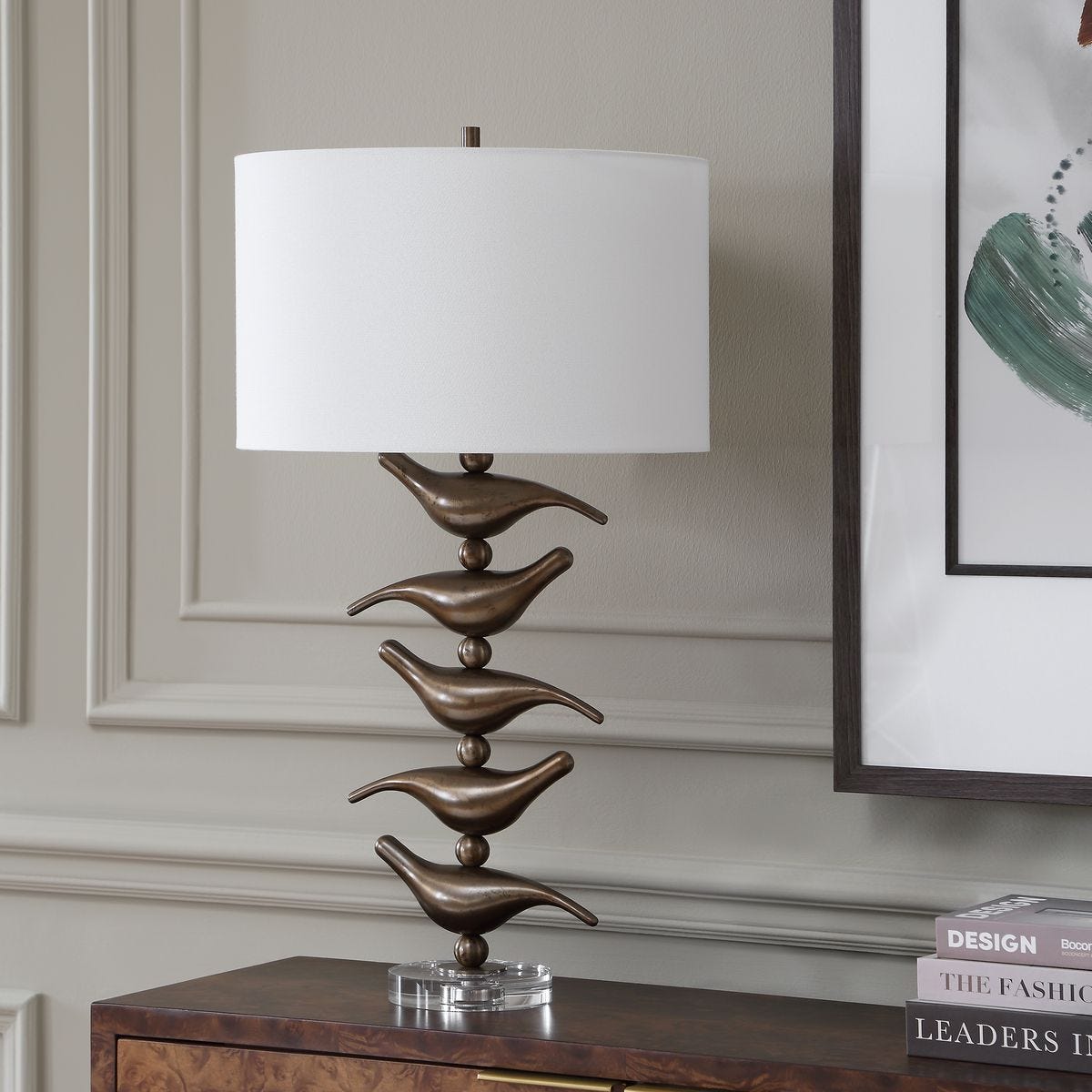 Side view of the Sing Song Golden Bronze Bird Table Lamp by Uttermost