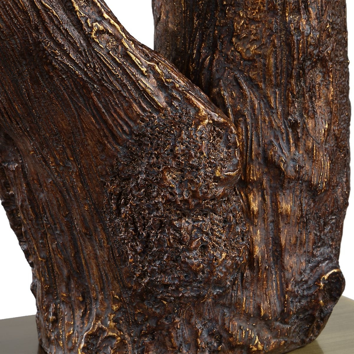 Close-up of the Namath Antique Brass Textured Table Lamp textured base