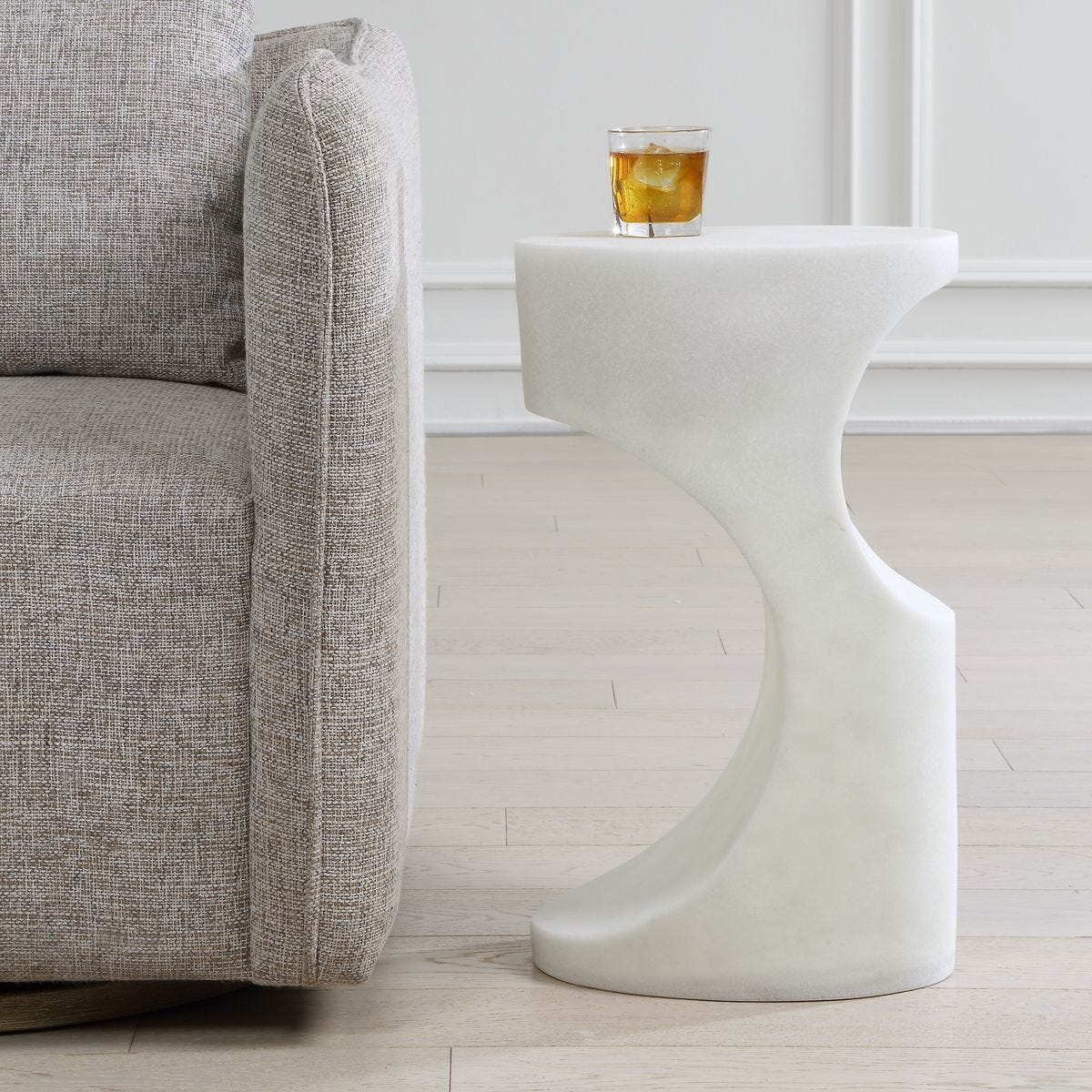 Stevie White Stone Indoor-Outdoor Accent Table styled in an outdoor setting