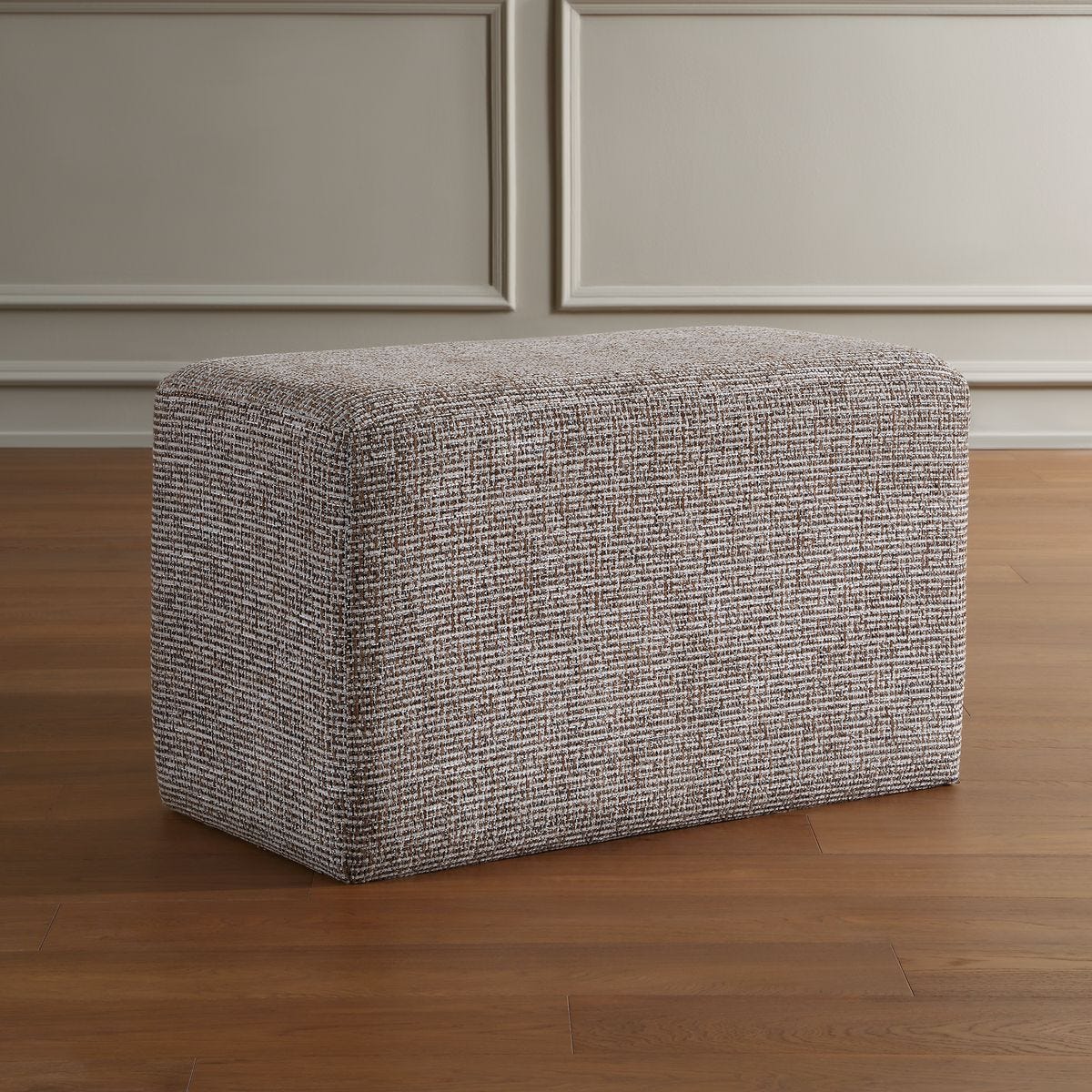 Detail view of the additional caramel finish on the Kelce Caramel Checkered Ottoman