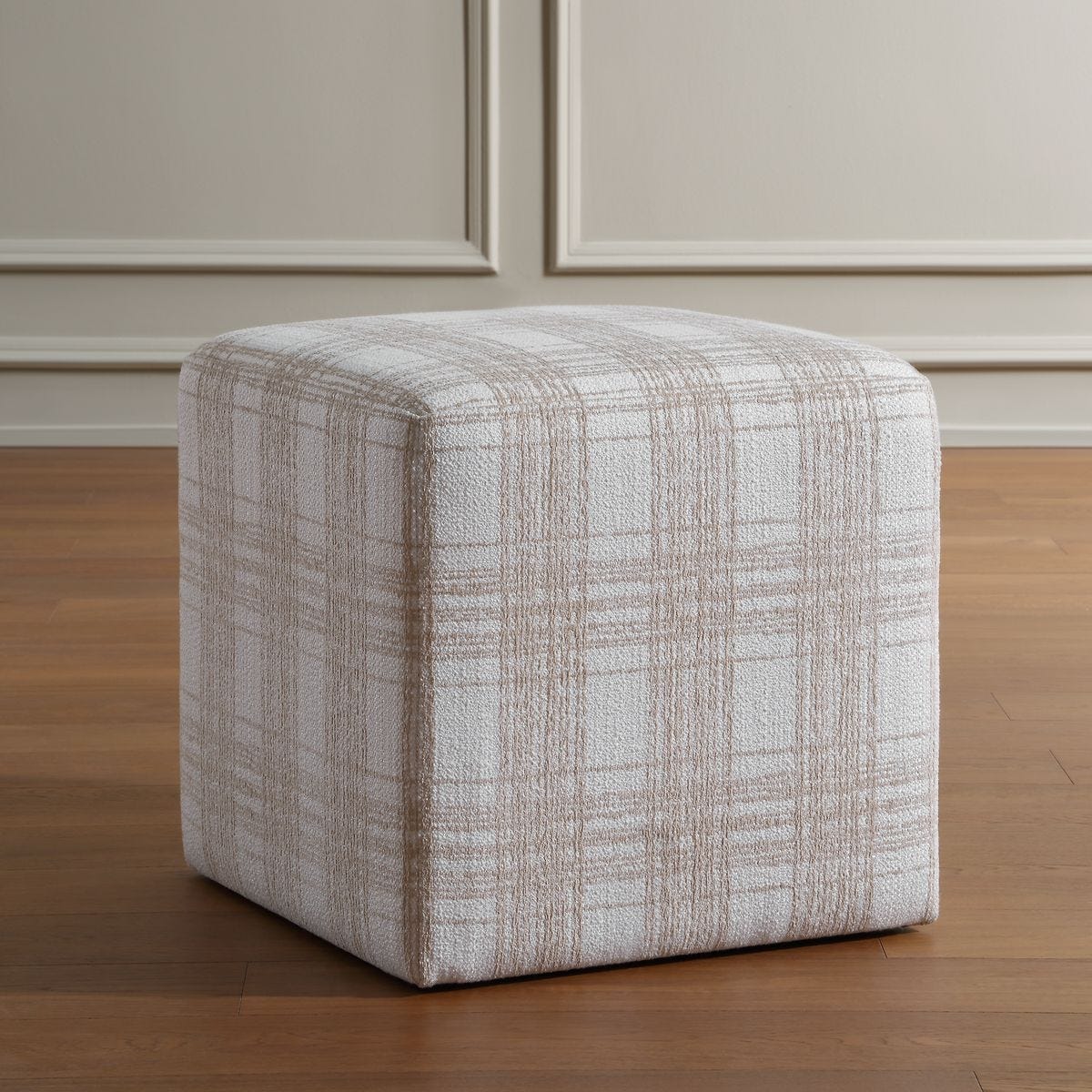 Detail view of the Joie Porcelain Plaid Ottoman finish and construction
