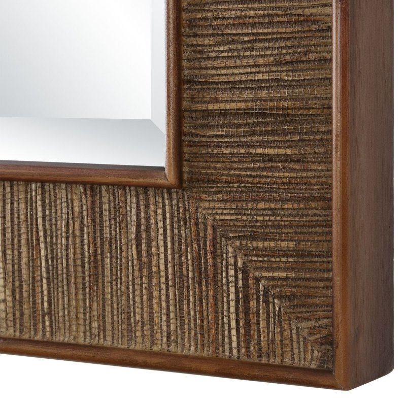 Close-up of the additional solid wood detail on the Aldous Walnut Jute Wall Mirror