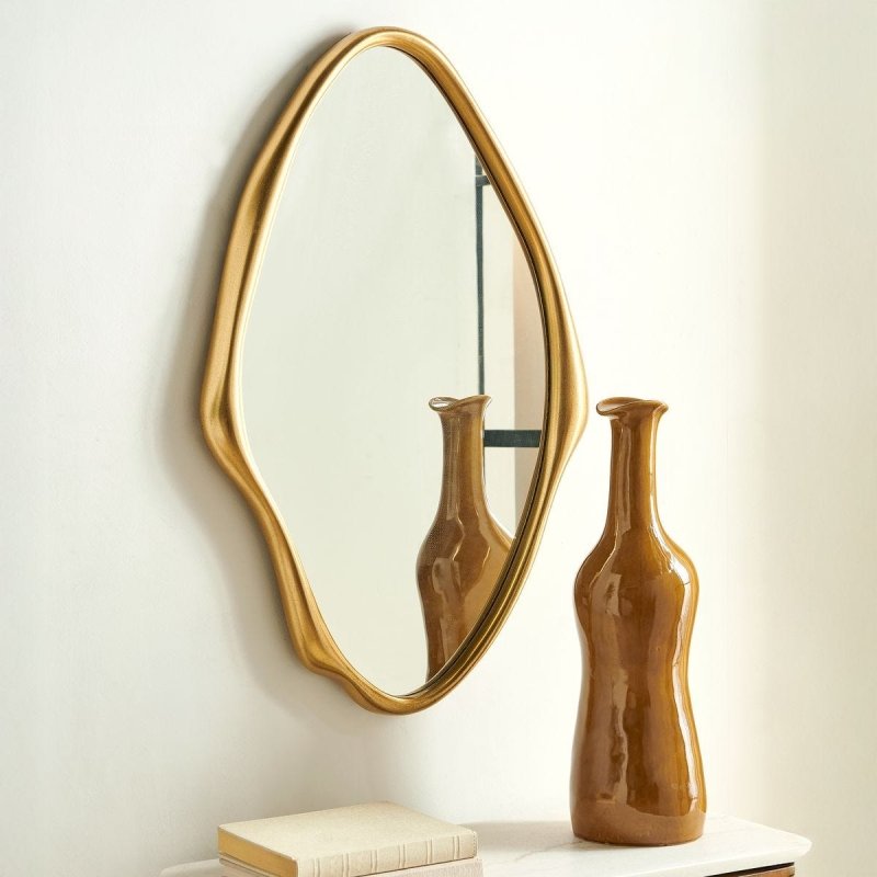 Close-up of the additional antique gold finish on the Aster Antique Gold Wall Mirror