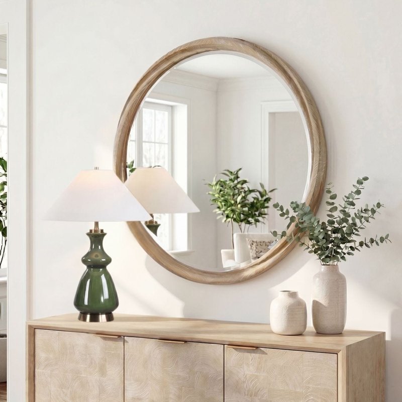 Side view of the Landry Cerused Wood Round Mirror by Uttermost