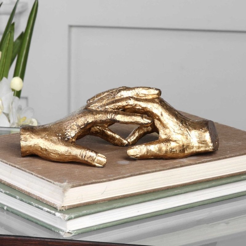 Hold my Hand Sculpture by Uttermost intertwined hands sculpture angled view gold leaf iron