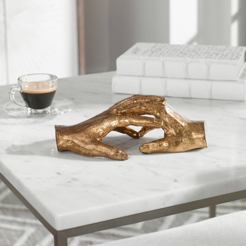 Hold my Hand Sculpture by Uttermost intertwined hands sculpture styled shelf scene gold leaf decor
