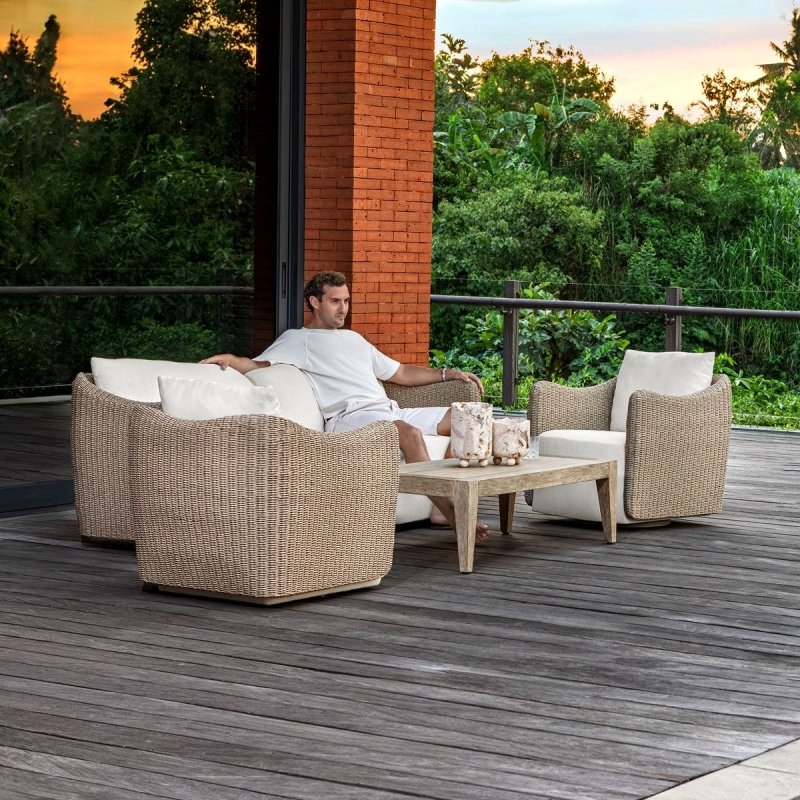 Sunset outdoor sofa styled with matching outdoor lounge seating